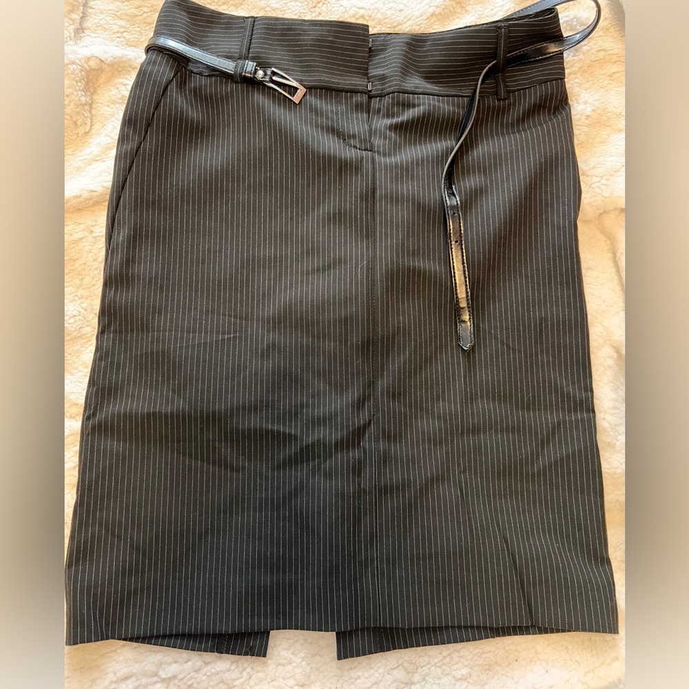 Women’s black pinstripe dress skirt.  Very pretty, size 2